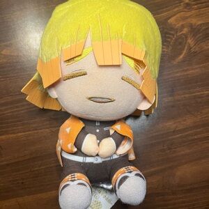 Yellow and Orange Plush Doll